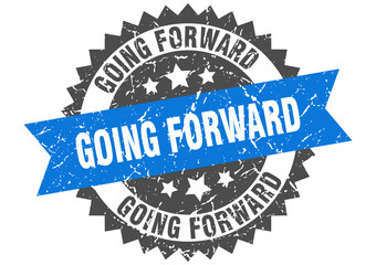 going forward stamp. grunge round sign with ribbon