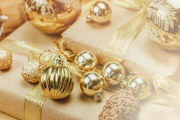 Christmas background. Close-up view of festive Christmas decorations and gift boxes. Celebrating Christmas