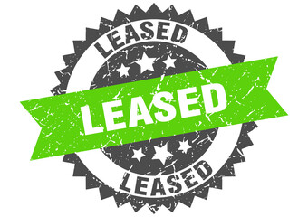 leased stamp. grunge round sign with ribbon