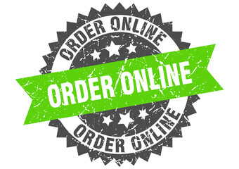 order online stamp. grunge round sign with ribbon