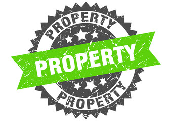 property stamp. grunge round sign with ribbon