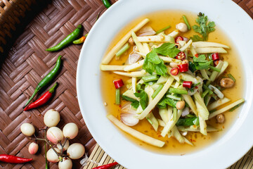 Crispy Catfish Salad on wooden background.