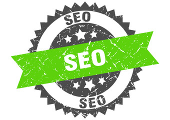 seo stamp. grunge round sign with ribbon