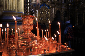 burning candles in church