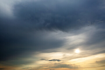 Dramatic sky at sunset. heavy dark clouds