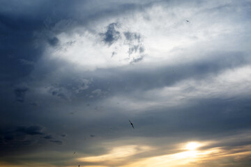 Dramatic sky at sunset. heavy dark clouds
