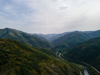 Aerial drone view of valley road in the mountains