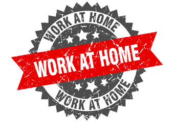 work at home stamp. grunge round sign with ribbon