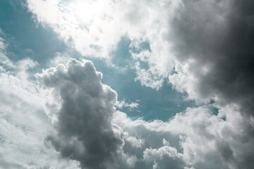 Obraz premium Scary thunderclouds. Gloomy epic clouds on a blue sky.