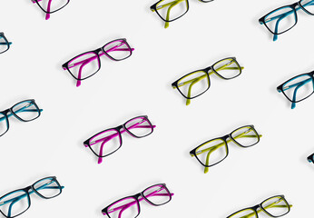 pattern made with colorful glasses on blue background