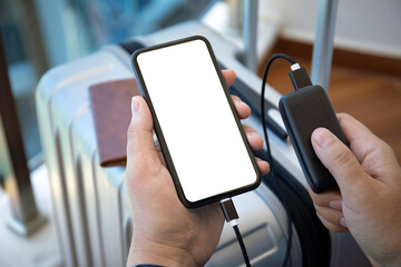 man hands holding phone with isolated screen and powerbank suitcase