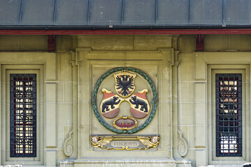 sculpture of coat of arms on a facade of the old town of Bern, Switzerland
