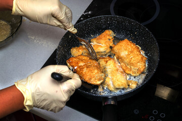 Delicious and healthy fish is fried in a pan in the best way to serve on the dining table.Similar photos.