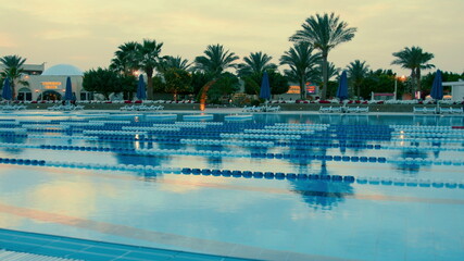 Beautiful swimming pool with clean blue water. Open air pool in egypt.