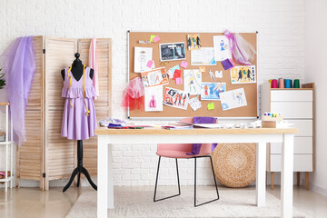 Workplace in studio of fashion designer