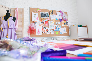 Workplace in studio of fashion designer