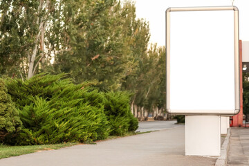 Blank advertising billboard on city street