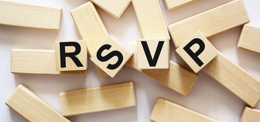 Request for rsvp acronym for an invitee response in wood-based printing blocks