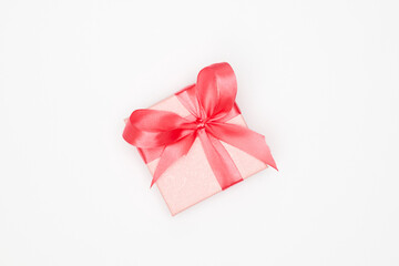 Pink christmas gift on white background isolate, flatley, copy space