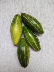 Pointed Gourd or parwal is a green, thin skinned vegetable that has a mild taste and edible crunchy seeds. Popularly used with potato in vegetables, it is also cooked by stuffing with spices