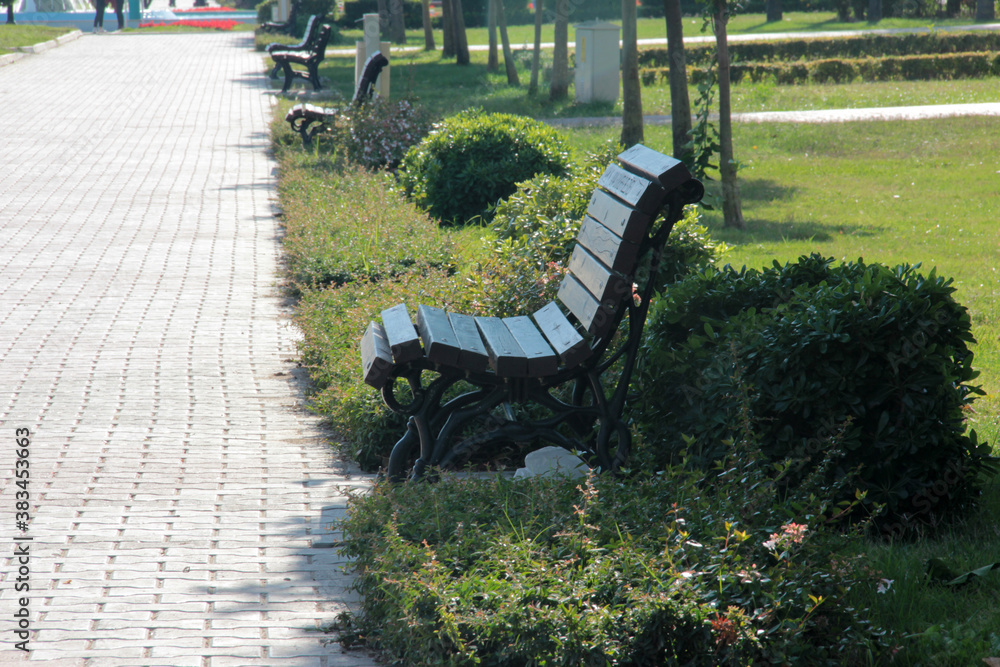 Wall mural stylish and modern bench for the garden