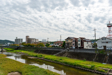 Fototapeta na wymiar City view along Muko river of Sanda city, Hyogo, Japan