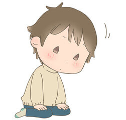 座ってうなずく男の子