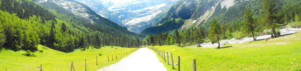 walk through an authentic natural setting. In the background one of the highest waterfalls in Europe. Le cirque du Gavarnie