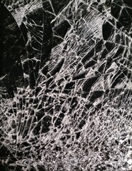 Broken glass on black background