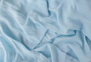  Stylish blue horizontal linen background with soft shadow and folds. Abstract modern blue background in minimal style