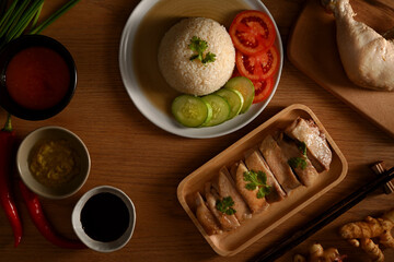 Hainanese chicken rice or steamed chicken rice with three sauces