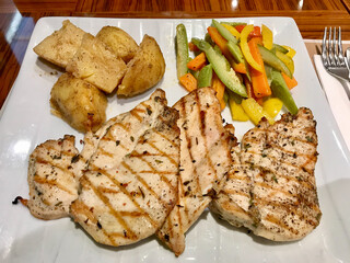 Healthy Protein Fitness Food Chicken Breasts in Plate with Boiled Vegetables and Potatoes for Diet.