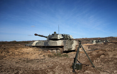 Fototapeta premium Armenian artillery mounts in the field perform shooting