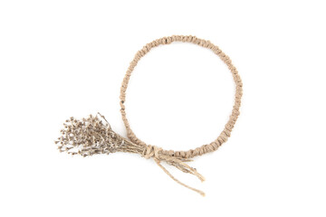 Circle frame of jute with dried grasses moss isolated on white background. Wild herbs or flowers decorations, diy concept.