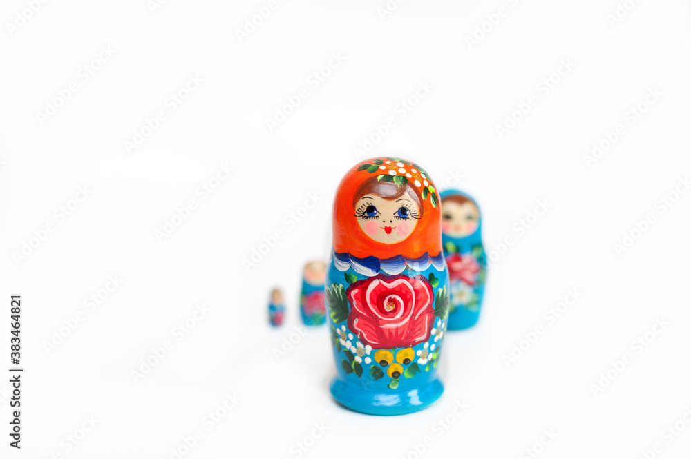 Wall mural wooden Russian dolls on a white background