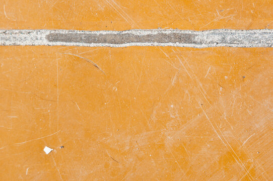 poor substandard floor covering. grunge background. flooring. copy space. Crack in linoleum floor. linoleum has come apart at the seam. hole in the floor.