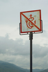 Warning sign indicating NO FISHING. Fishin prohibition sign.