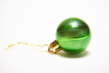 Green Christmas ball on a white background, New Year, Christmas toys, holiday, Christmas.