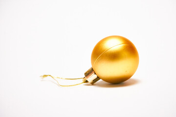 Yellow Christmas ball on a white background, New Year, Christmas toys, holiday, Christmas.