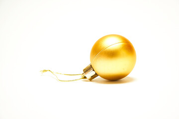 Yellow Christmas ball on a white background, New Year, Christmas toys, holiday, Christmas.