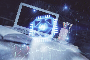 Double exposure of desktop computer and technology theme hologram. Concept of software development.