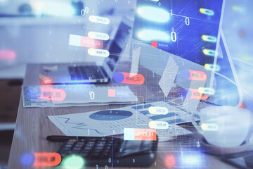 Double exposure of desktop computer and technology theme hologram. Concept of software development.