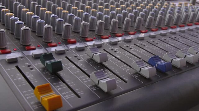 audio sound mixer, slides and knobs, music equipment