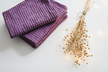 Natural pure linen towels, napkins or tablecloth. Colourful linen cotton fabrics on fabric background. Food photo props