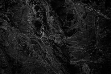 Black and white abstract background. Black stone background. Monochrome rock texture. Marble effect.