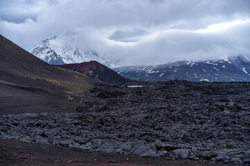 Active lava flow against the background of the Ostry Tolbachik volcano - Kamchatka, Russia.