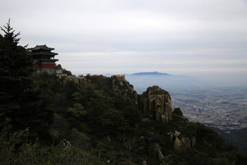 A temple on the mountain beside the city