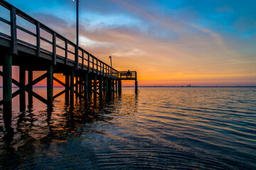 pier at sunset on the alabama gulf coast 