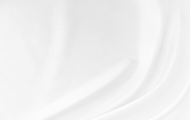 White gray satin texture that is white silver fabric silk background with beautiful soft blur pattern natural.