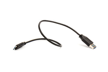 USB cable close up on white background. Charge, plugging, equipment and electricity